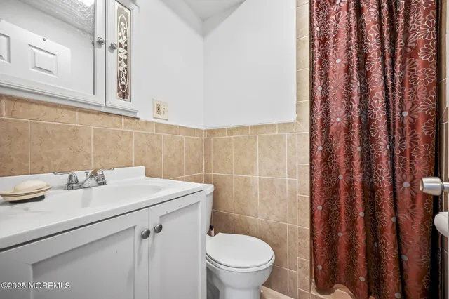 a bathroom with a sink and a toilet