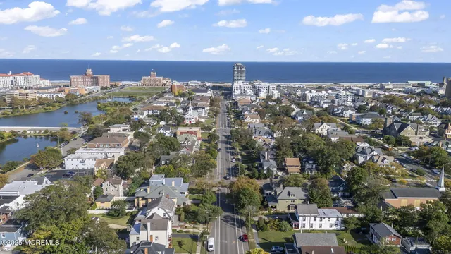 an aerial view of a city with lake view