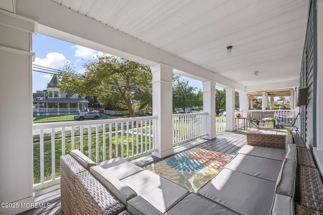 a living room with large windows