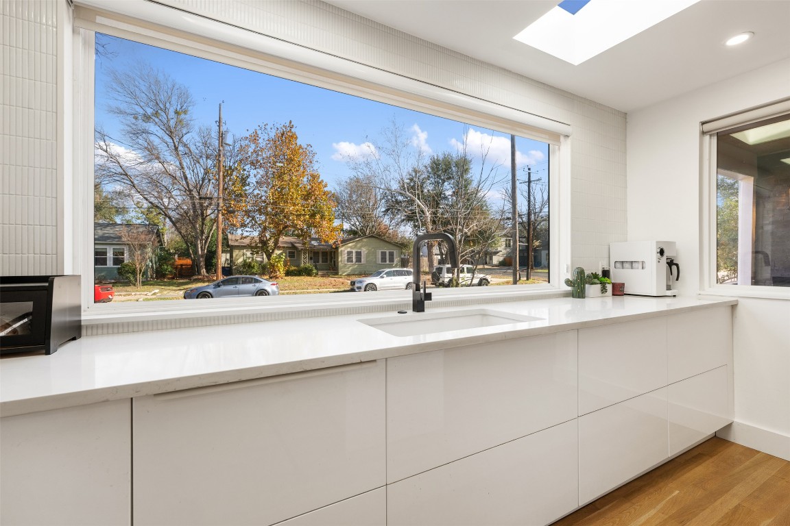 1403 Palo Duro Road Austin, TX 78757 - Photo 13 of 34 a view of a sink and a mirror