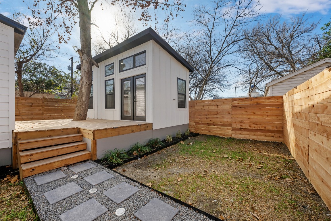 1403 Palo Duro Road Austin, TX 78757 - Photo 26 of 34 a view of a house with a yard