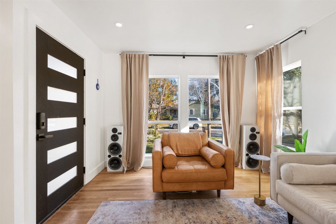 1403 Palo Duro Road Austin, TX 78757 - Photo 3 of 34 a living room with furniture and a large window