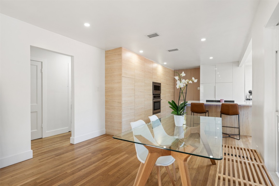 1403 Palo Duro Road Austin, TX 78757 - Photo 7 of 34 a view of a dining room with furniture