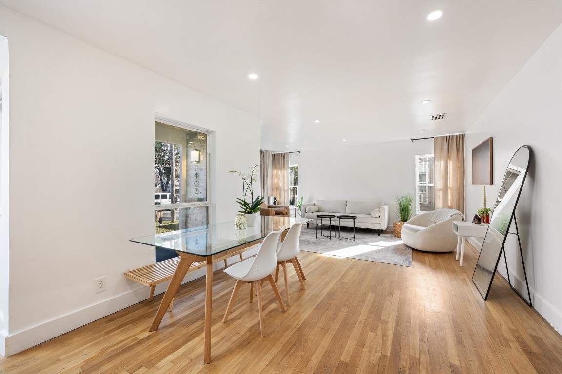 1403 Palo Duro Road Austin, TX 78757 - Photo 9 of 34 a living room with furniture and wooden floor