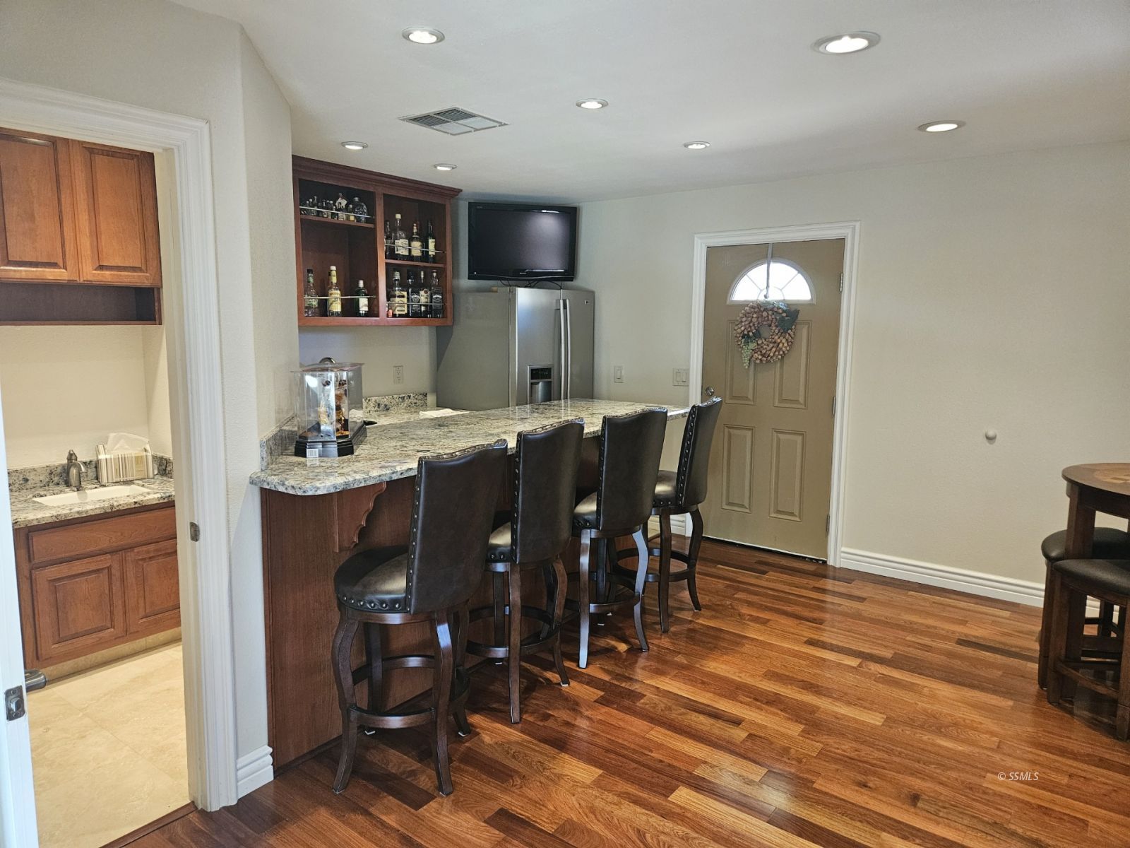 928 North Brady Street Ridgecrest, CA 93555 - Photo 15 of 21 a view of a dining room with furniture and wooden floor