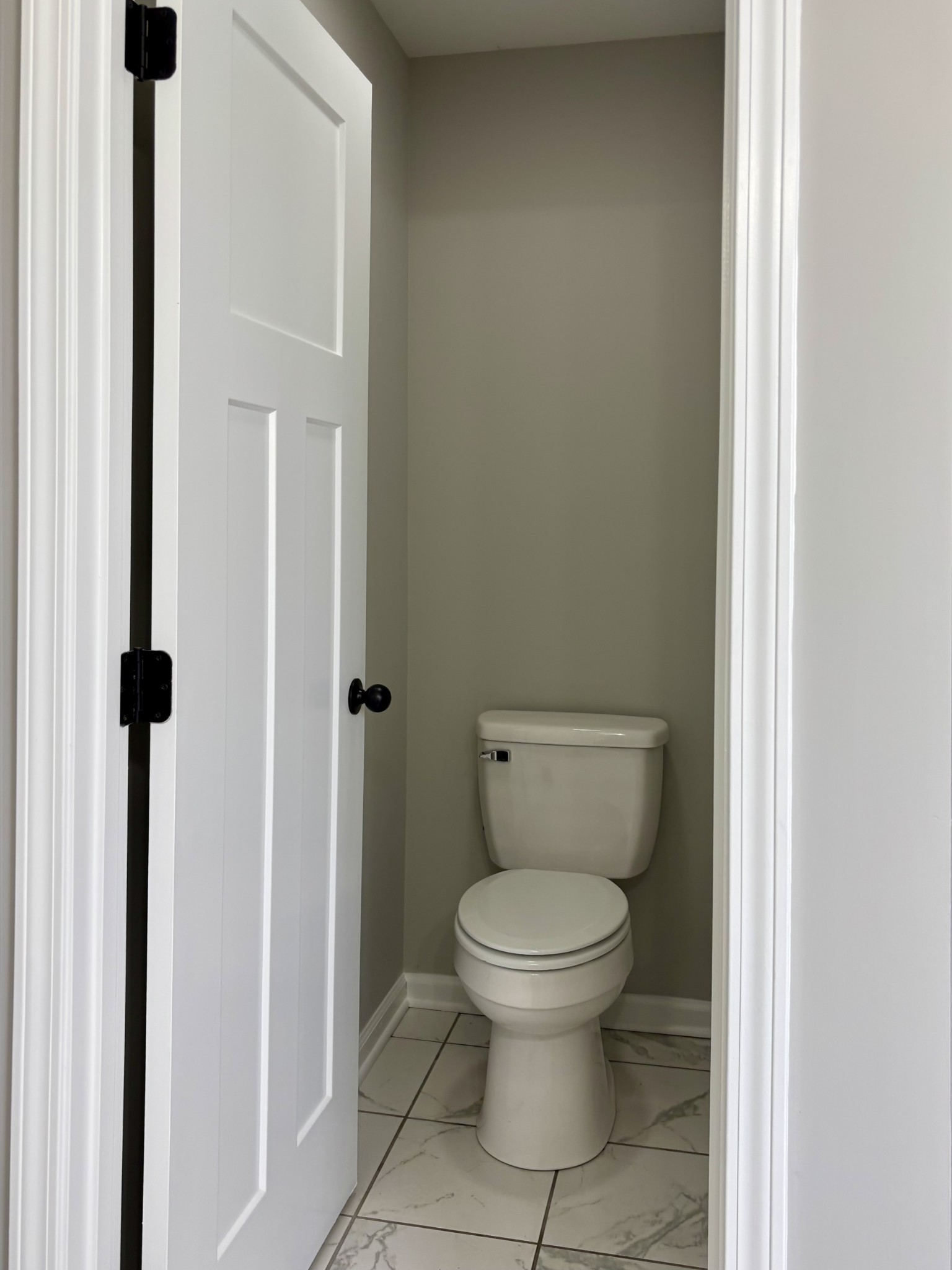 51 Regency Place Manchester, TN 37355 - Photo 16 of 27 a white toilet sitting next to a shower