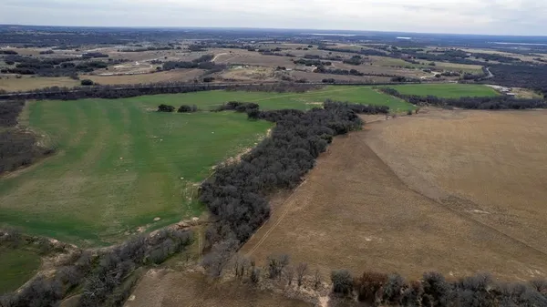 a view of a lake with a city