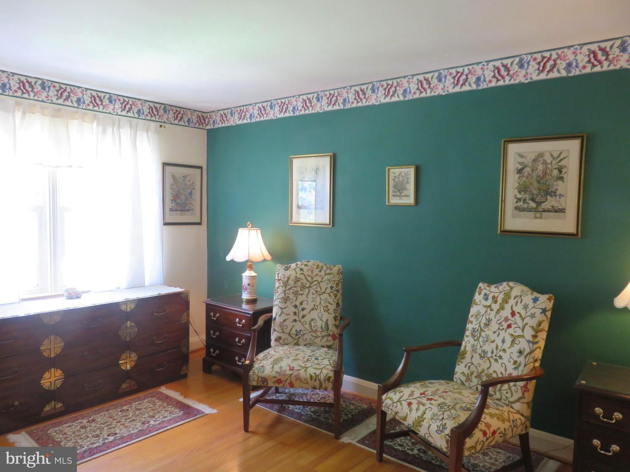 8428 Pleasant Plains Road Baltimore, MD 21286 - Photo 15 of 29 a living room with furniture and a window