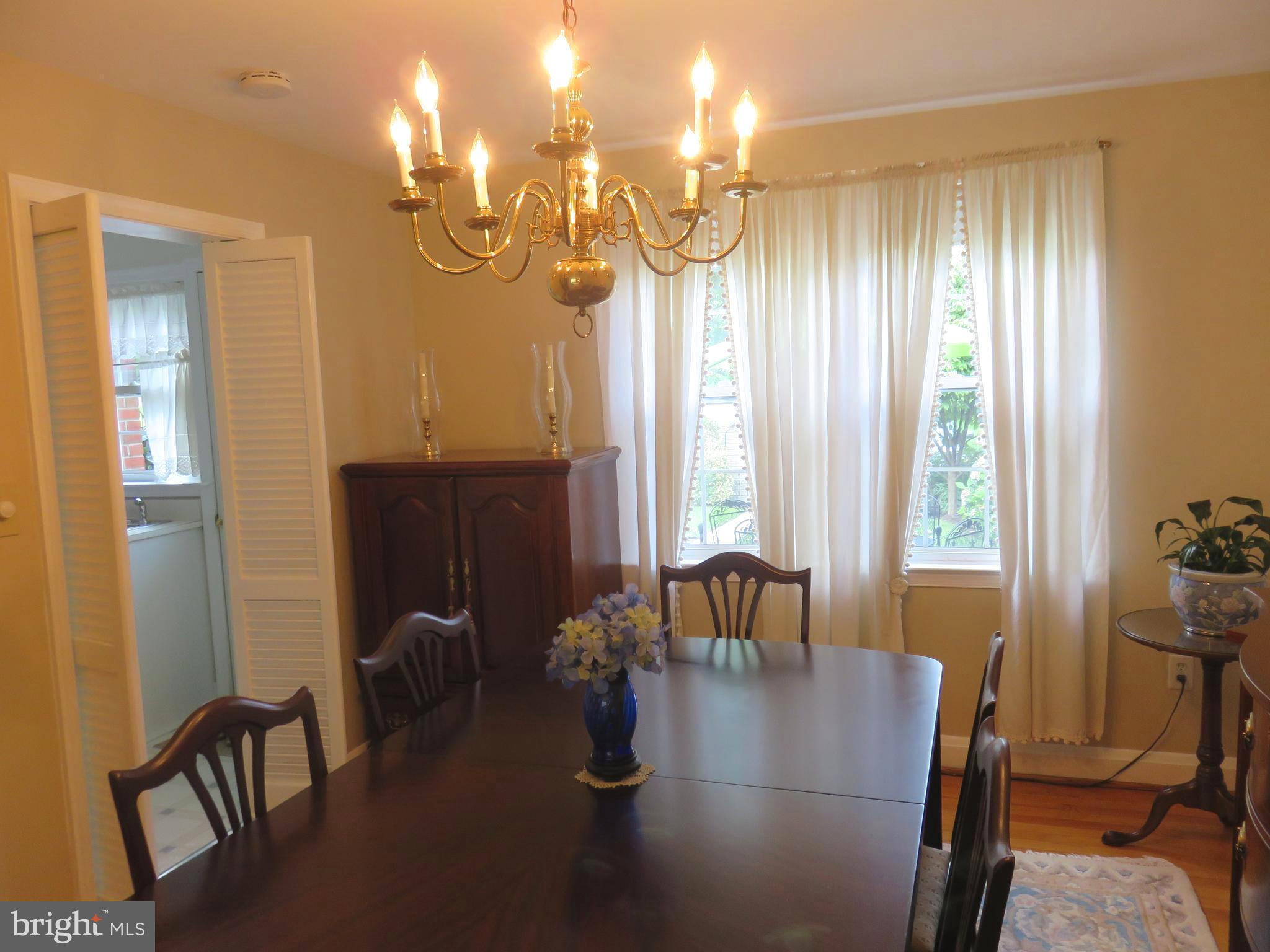 8428 Pleasant Plains Road Baltimore, MD 21286 - Photo 8 of 29 a dining room with furniture and window