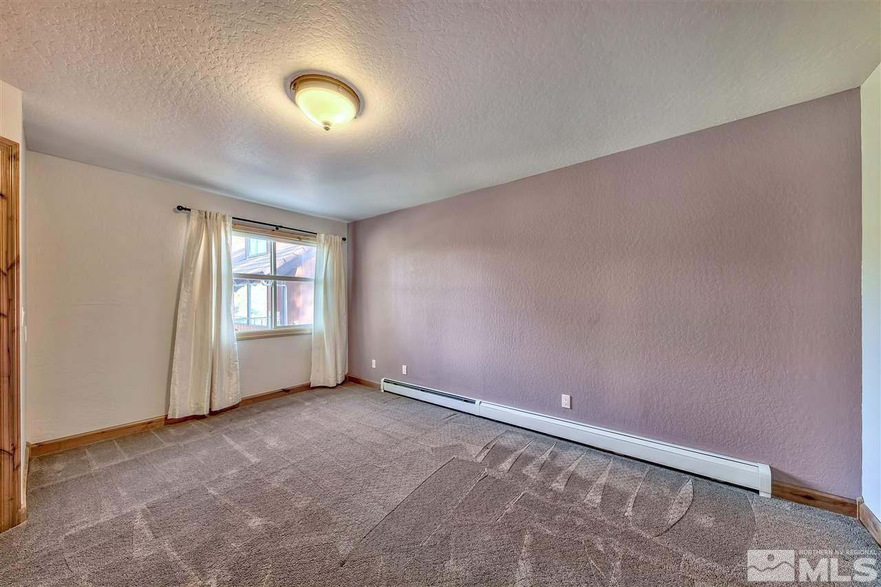 218 Terrace View Drive Stateline, NV 89449 - Photo 18 of 22 an empty room with windows and entrance