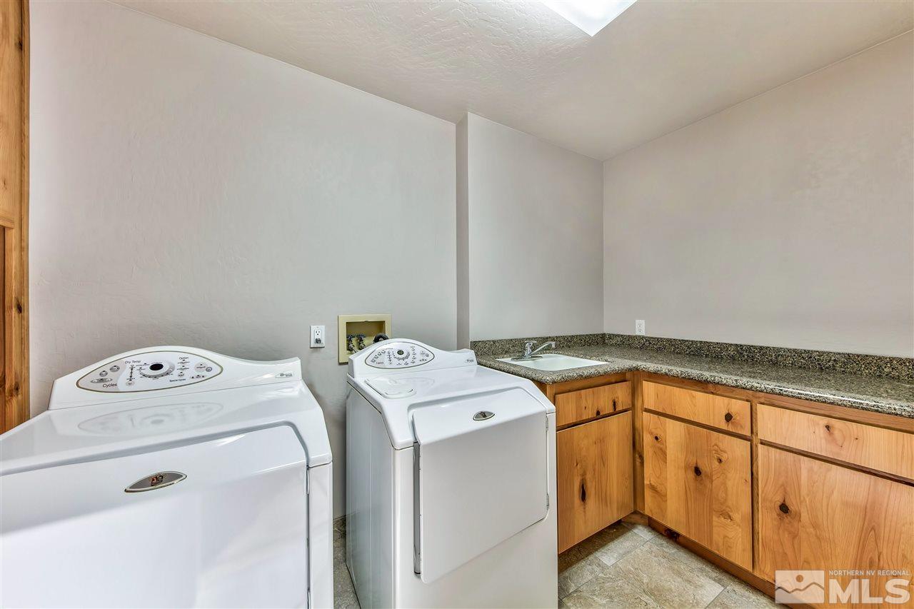 218 Terrace View Drive Stateline, NV 89449 - Photo 20 of 22 a utility room with dryer and washer