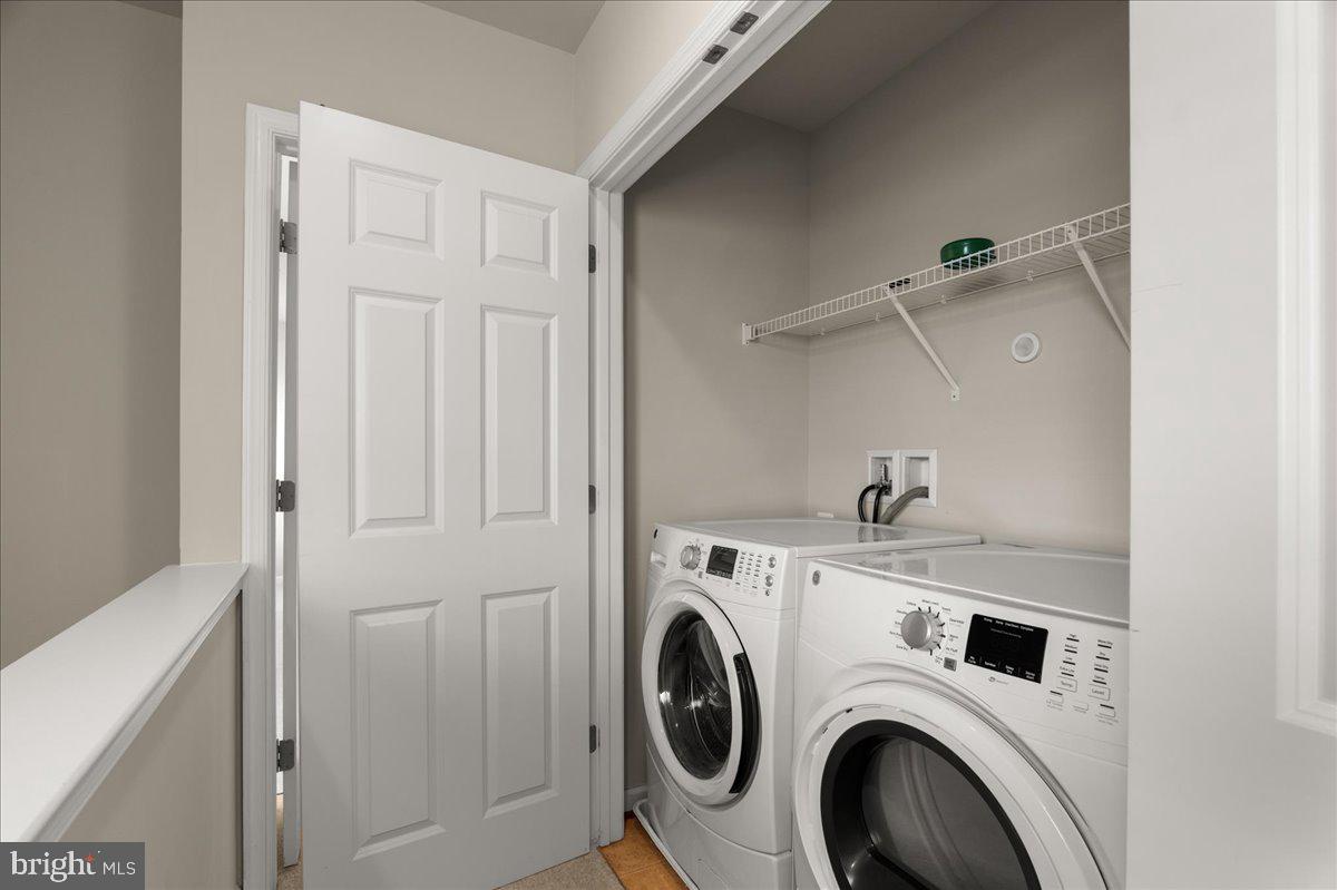 101 Jitterbug Way Stephenson, VA 22656 - Photo 24 of 39 a view of storage and utility room with washer and dryer