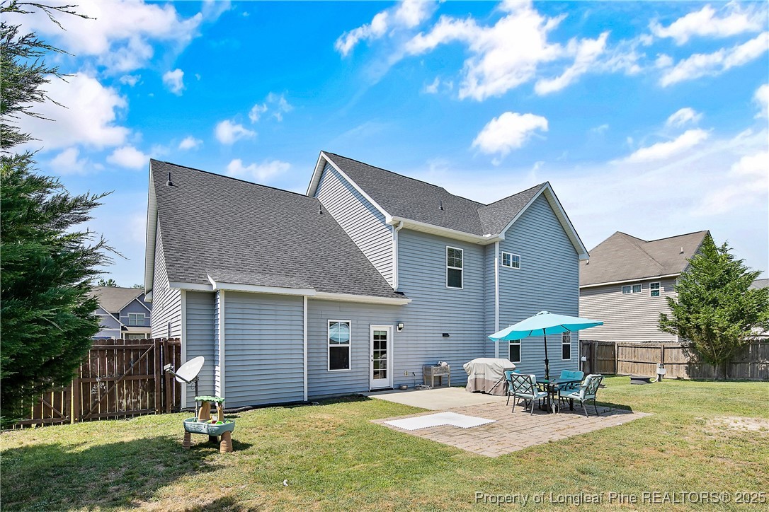 101 Shepard Drive Linden, NC 28356 - Photo 49 of 50 a view of a house with a patio