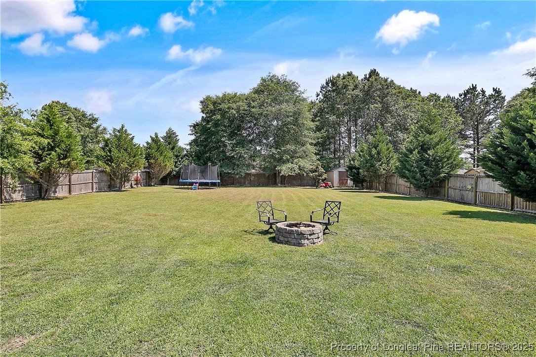 101 Shepard Drive Linden, NC 28356 - Photo 50 of 50 a view of a green field with wooden fence