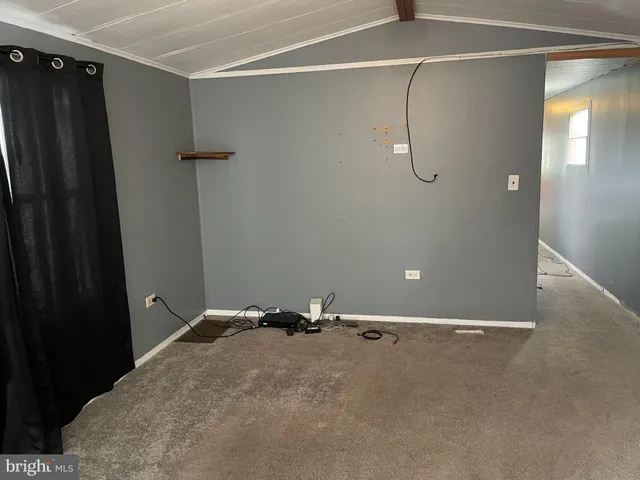 a view of a room with racks on the wall