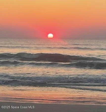 a view of street along with the road and shops
