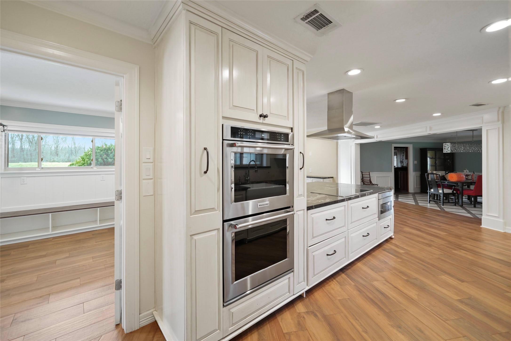 12201 FM 2759 Road Richmond, TX 77469 - Photo 11 of 50 a kitchen with stainless steel appliances kitchen island granite countertop a stove and a refrigerator