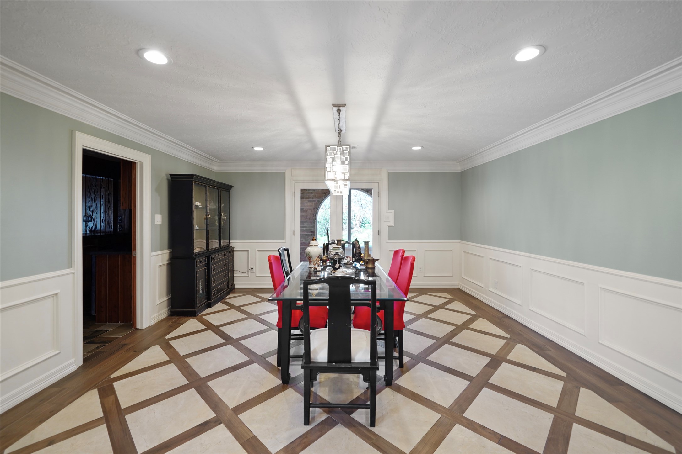 12201 FM 2759 Road Richmond, TX 77469 - Photo 14 of 50 a view of a dining room with furniture and chandelier