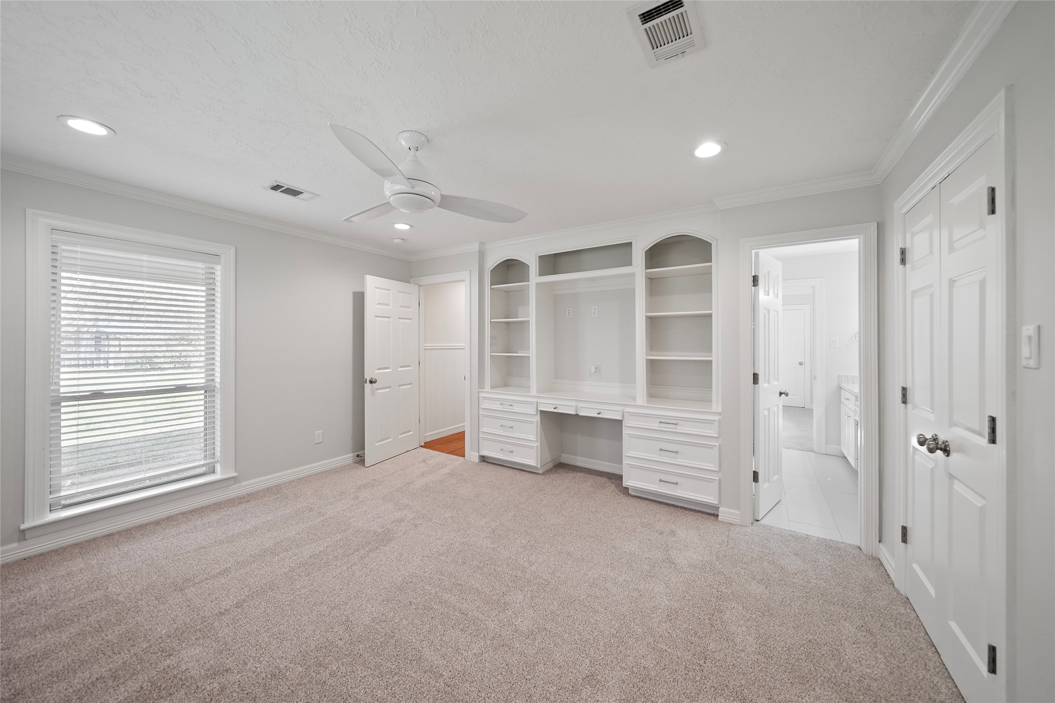 12201 FM 2759 Road Richmond, TX 77469 - Photo 16 of 50 an empty room with a cabinet and mirrors