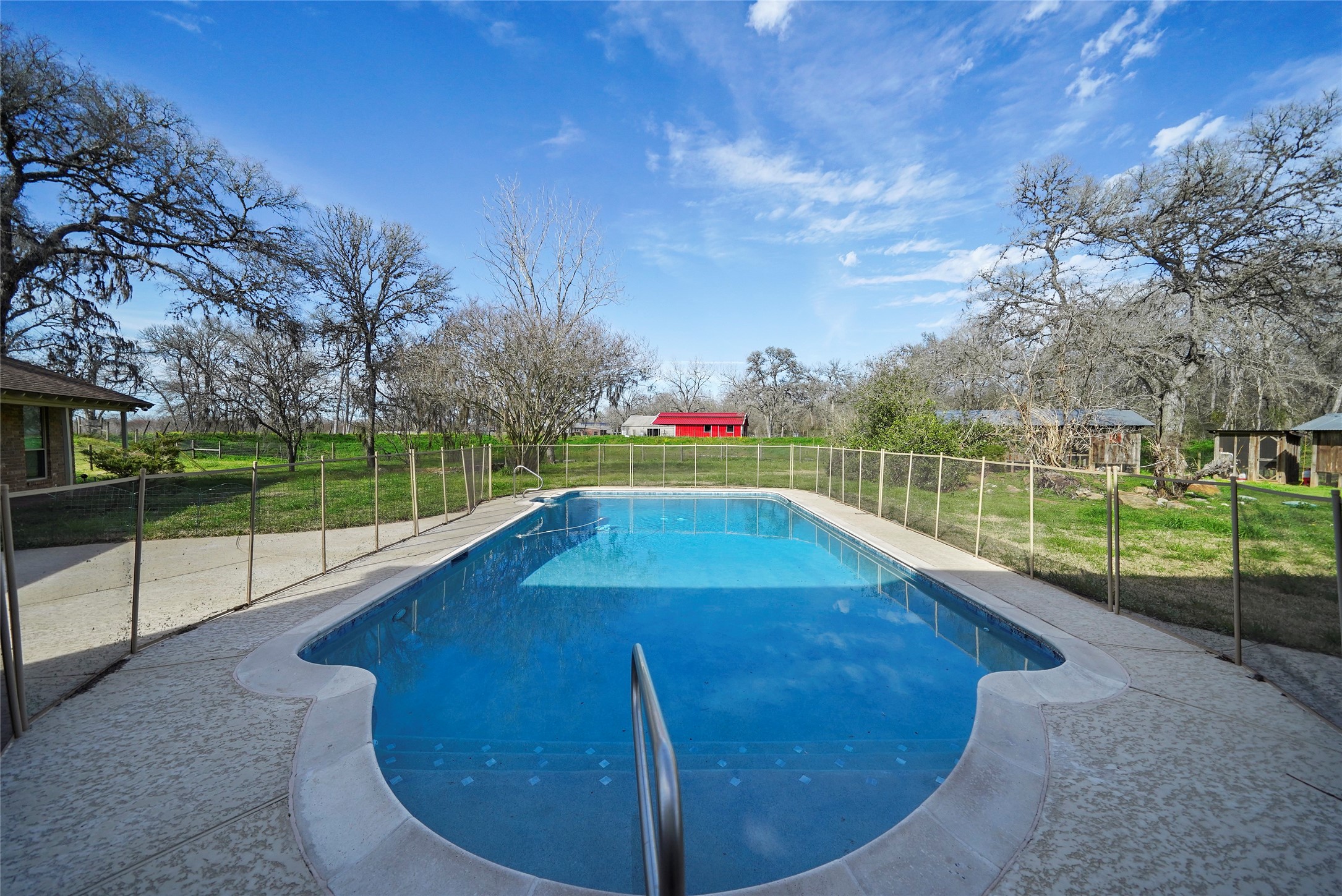 12201 FM 2759 Road Richmond, TX 77469 - Photo 30 of 50 a view of a swimming pool with a patio