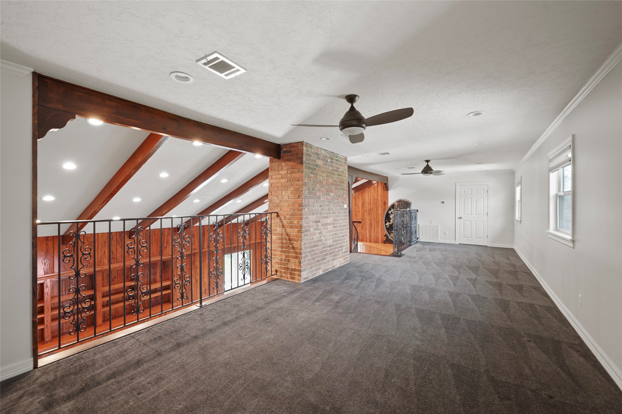 12201 FM 2759 Road Richmond, TX 77469 - Photo 5 of 50 a view of a livingroom with furniture and a ceiling fan