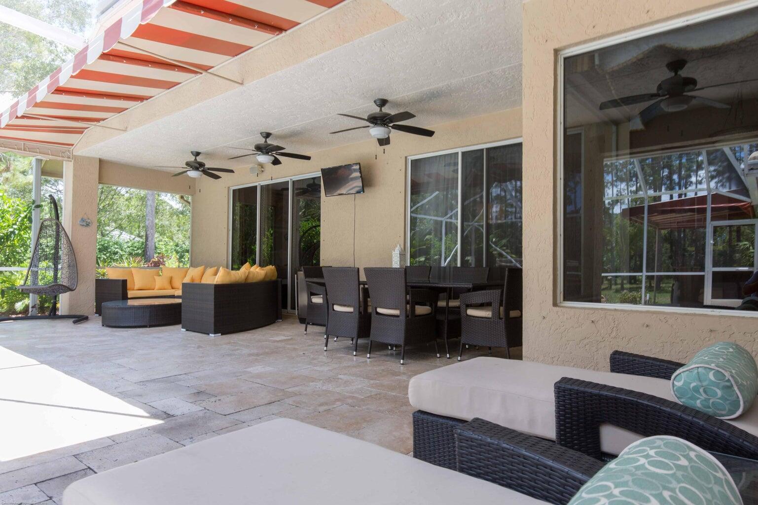 14816 Stirrup Lane Wellington, FL 33414 - Photo 24 of 30 a living room with furniture and a large window