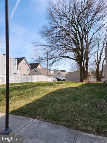 a view of a big yard next to a yard