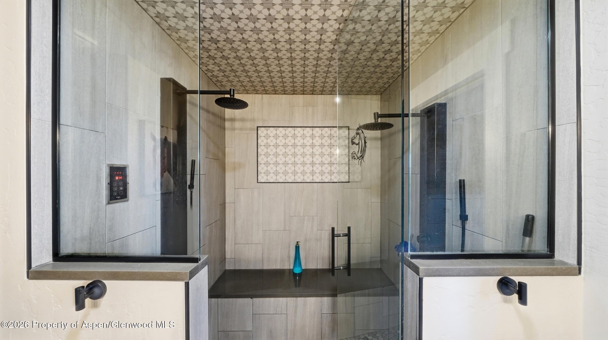 445 South Camp Road Grand Junction, CO 81507 - Photo 21 of 37 a bathroom with a sink and a mirror