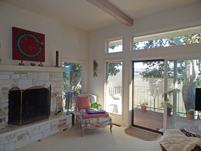 25530 Vía Paloma Carmel, CA 93923 - Photo 17 of 23 a living room with furniture and a fireplace