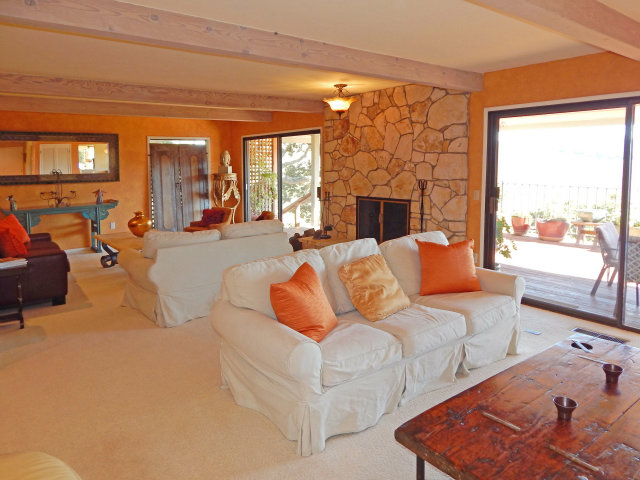 25530 Vía Paloma Carmel, CA 93923 - Photo 7 of 23 a living room with furniture and a fireplace