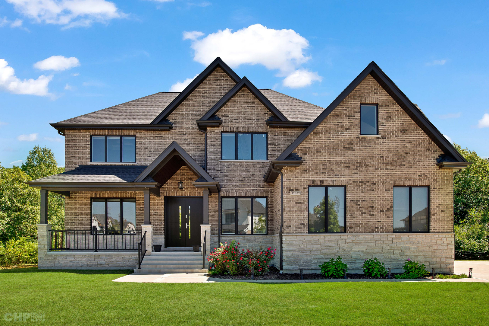 12832 Rosa Lane Lemont, IL 60439 - Photo 2 of 2 a front view of a house with a yard