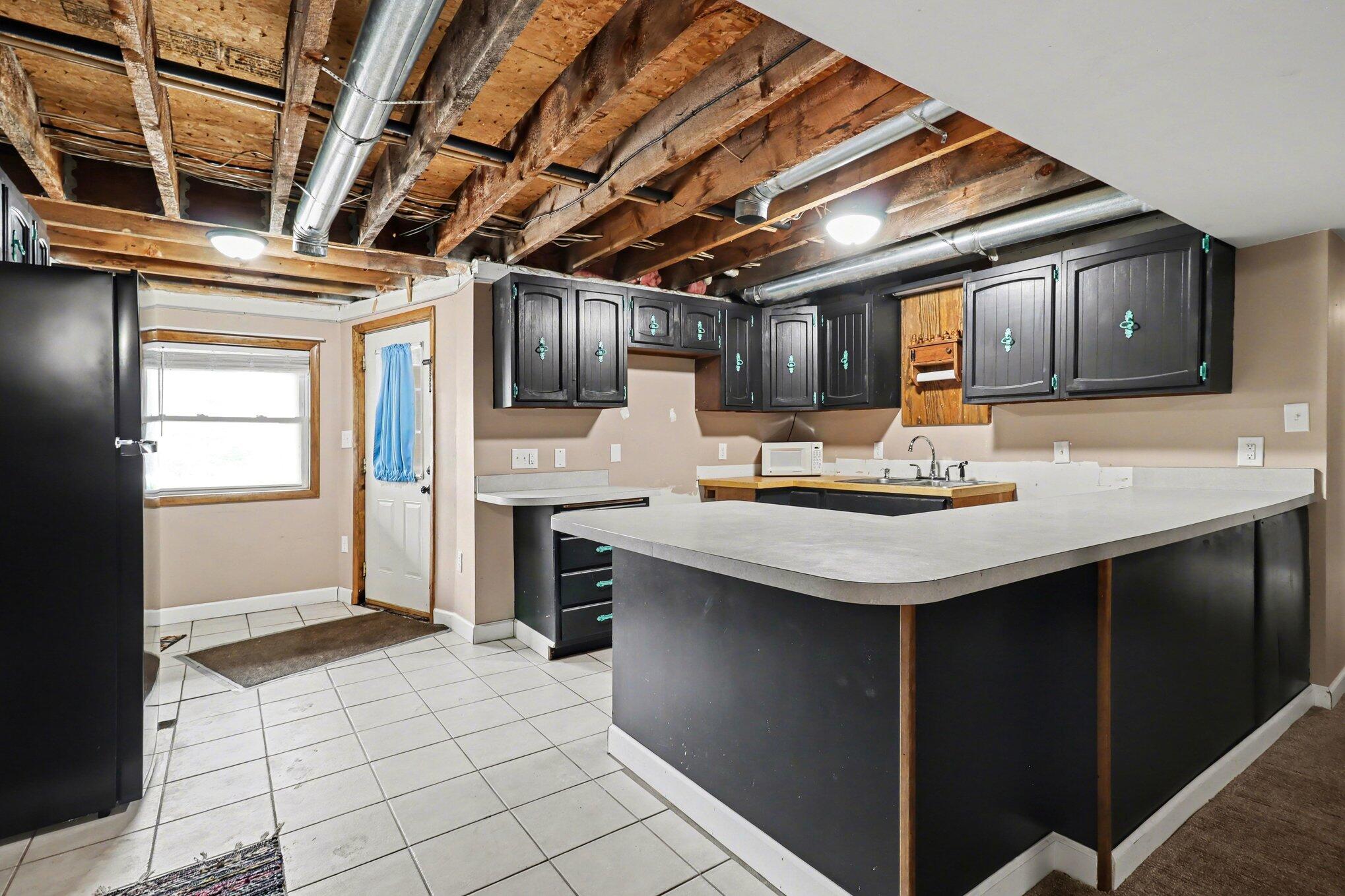 22848 13 Mile Road Big Rapids, MI 49307 - Photo 20 of 22 basement kitchen