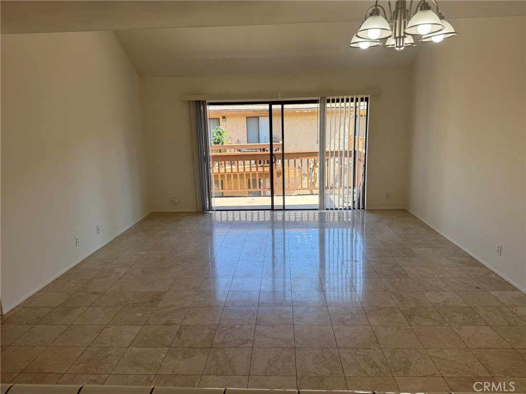 25 Orange Blossom, Unit 61 Irvine, CA 92618 - Photo 8 of 12 a view of an empty room with a window