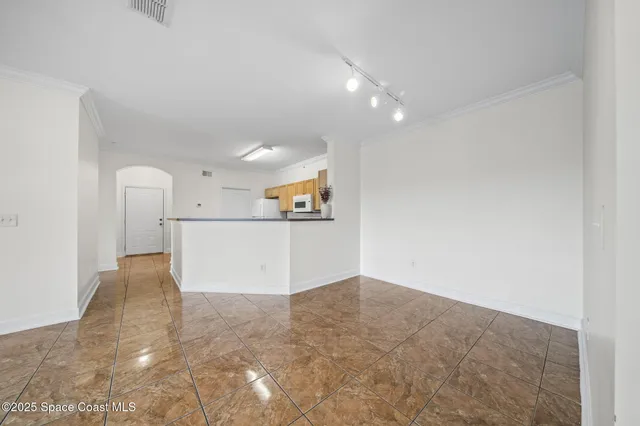 a view of a kitchen with a sink