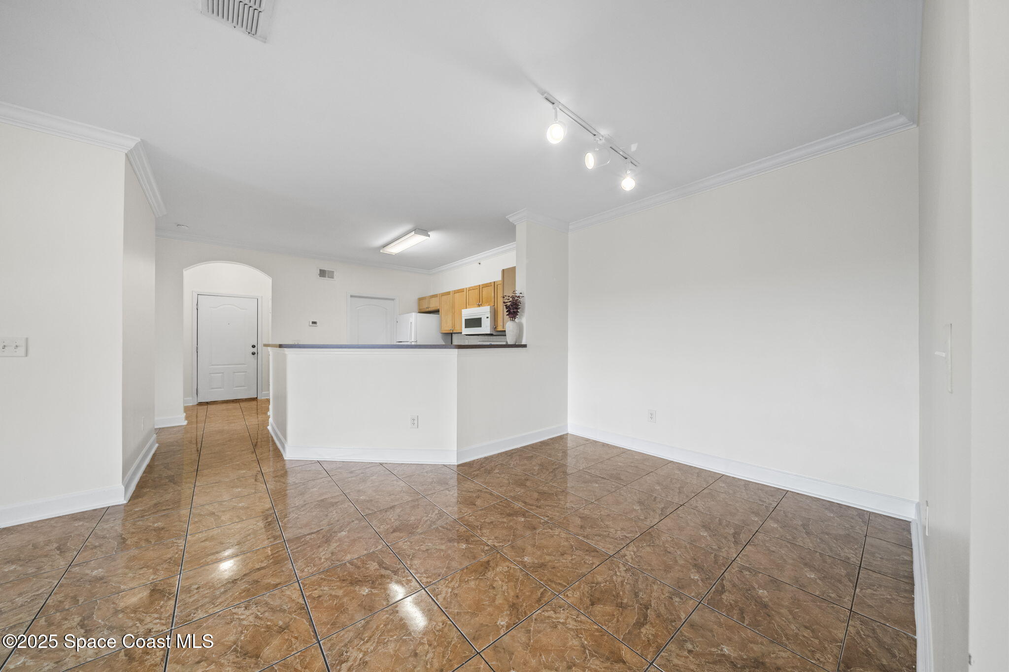 6421 Borasco Drive, Unit 3206 Melbourne, FL 32940 - Photo 11 of 36 a view of a kitchen with a sink
