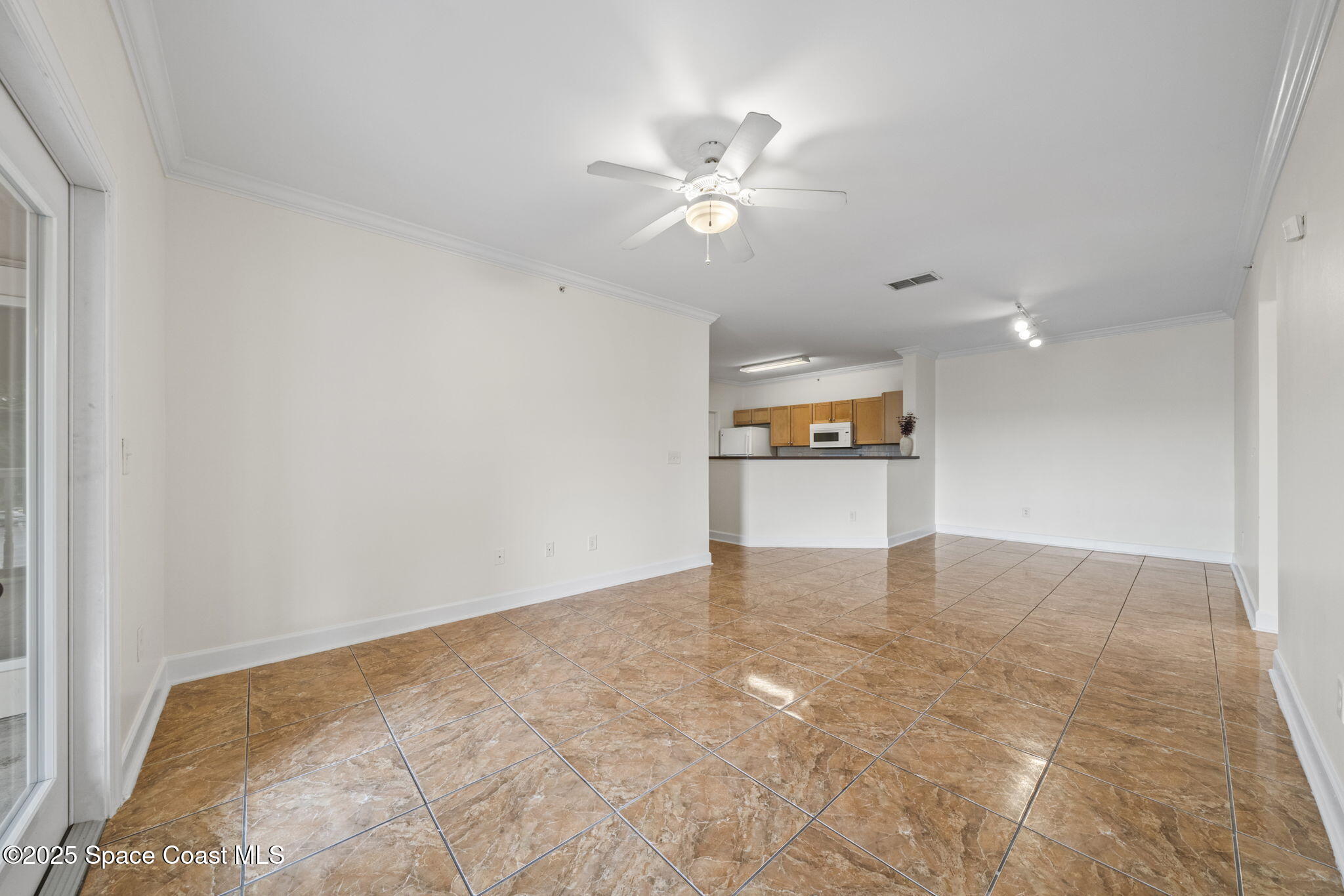 6421 Borasco Drive, Unit 3206 Melbourne, FL 32940 - Photo 15 of 36 a view of a kitchen with a sink