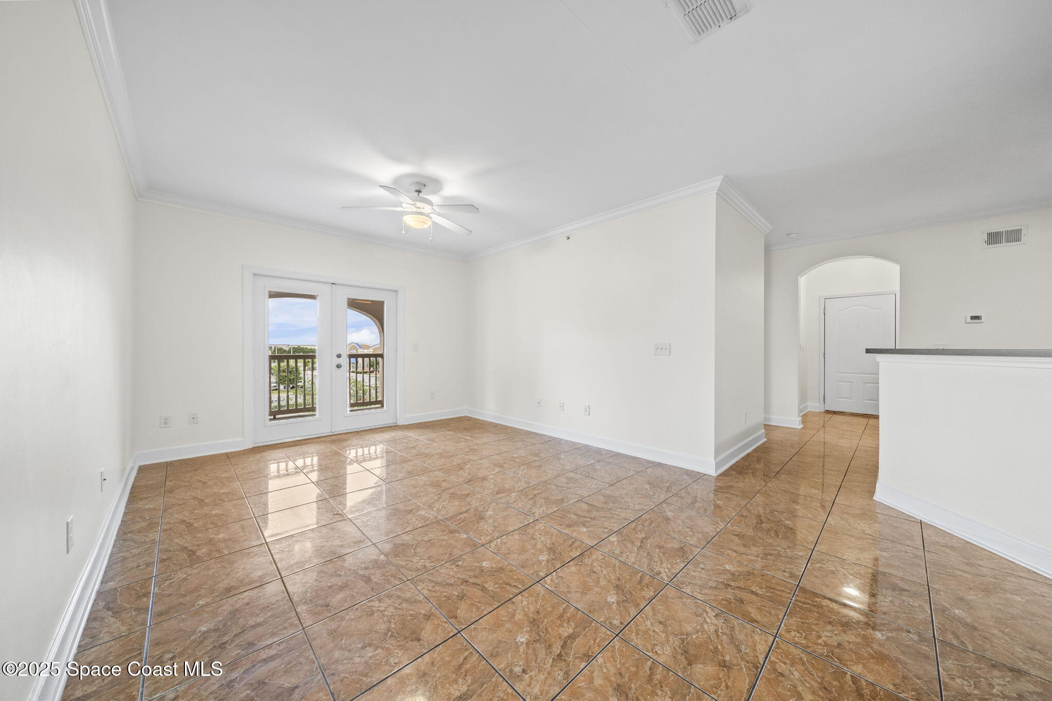 6421 Borasco Drive, Unit 3206 Melbourne, FL 32940 - Photo 19 of 36 a view of an empty room with a window