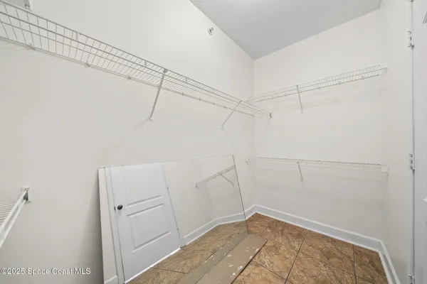 a view of a room with racks on the wall