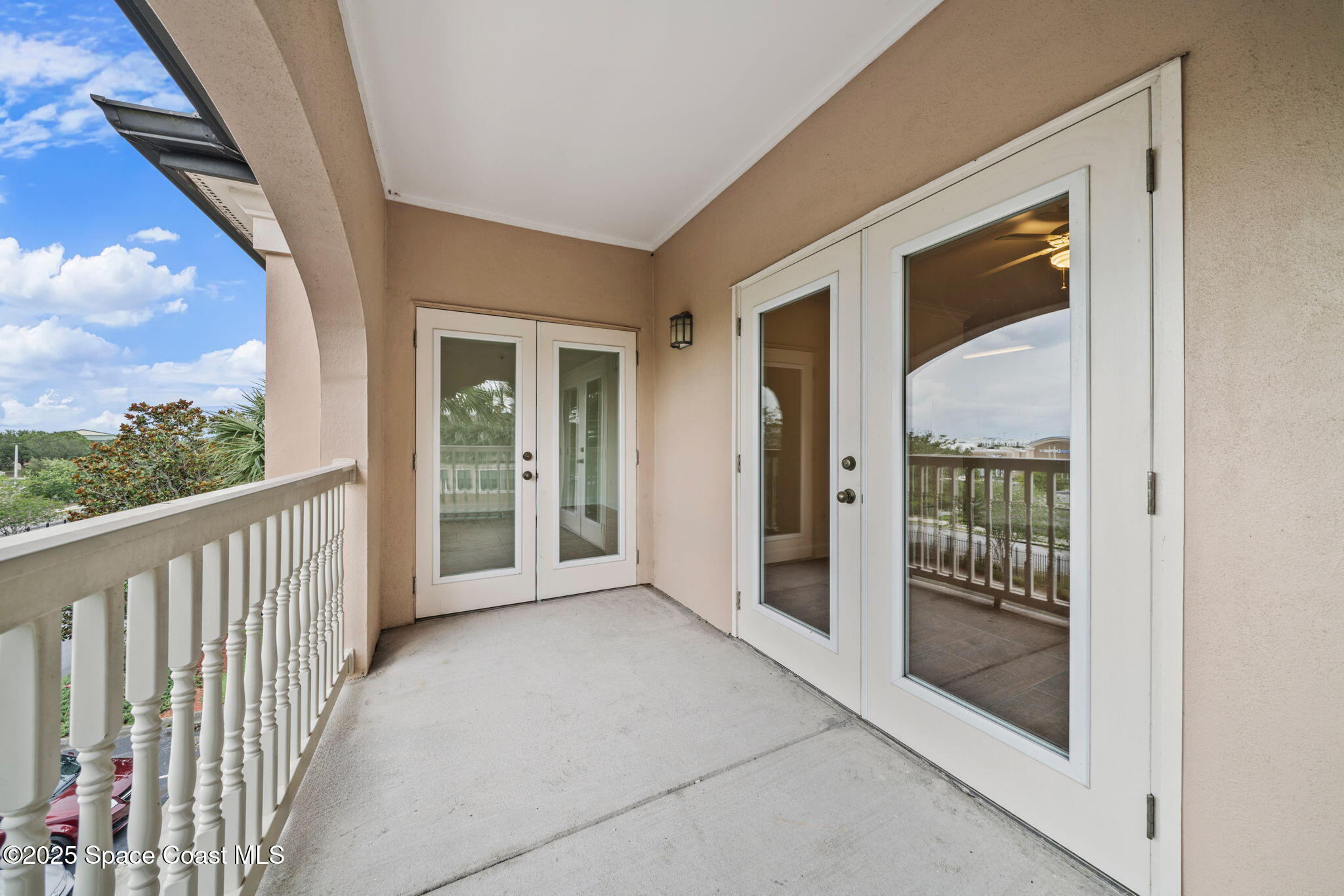 6421 Borasco Drive, Unit 3206 Melbourne, FL 32940 - Photo 33 of 36 a view of a porch of a house with a porch