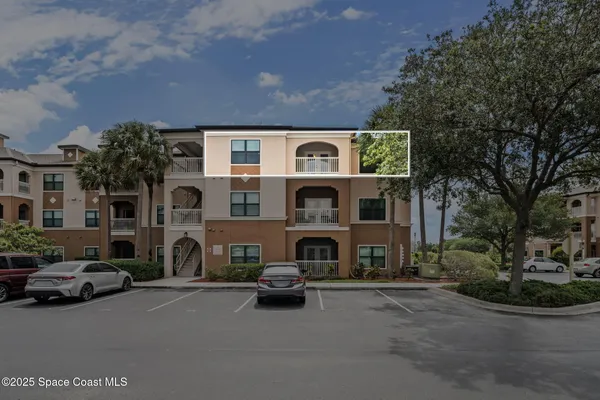 a view of a street with cars