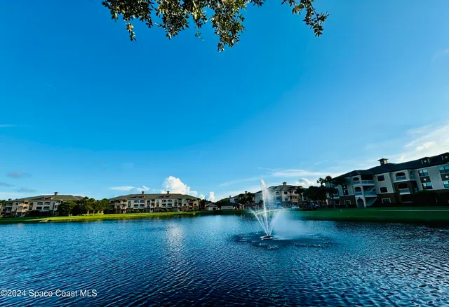 a view of a lake with houses