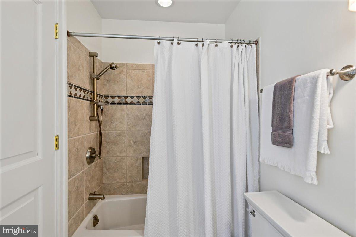 2700 Falling Timber Trail Edgewater, MD 21037 - Photo 37 of 89 a bathroom with a shower and a tub