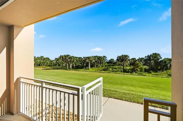 a view of a two chairs near an outdoor space