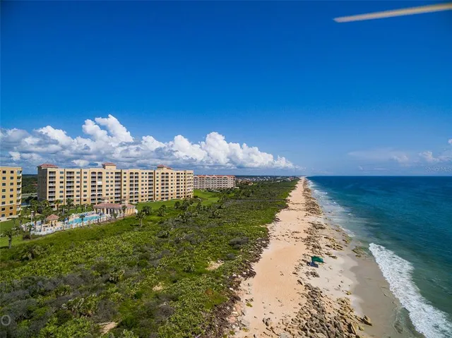 a view of a lake with a yard