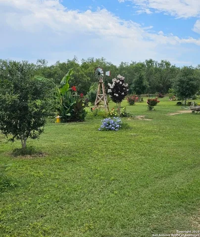 a view of a golf course with a park