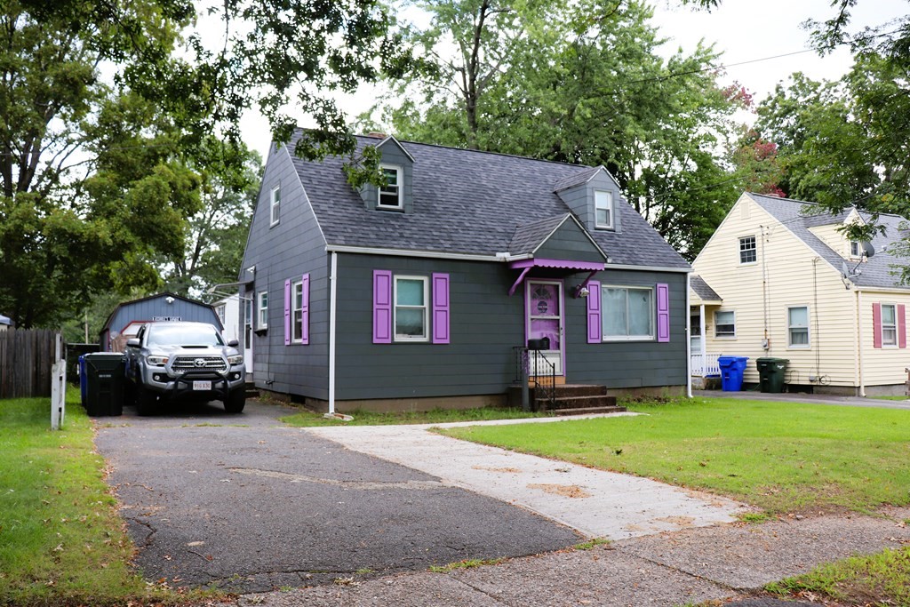 231 Rosewell Street Springfield, MA 01109 - Photo 1 of 24 a car parked in front of a house