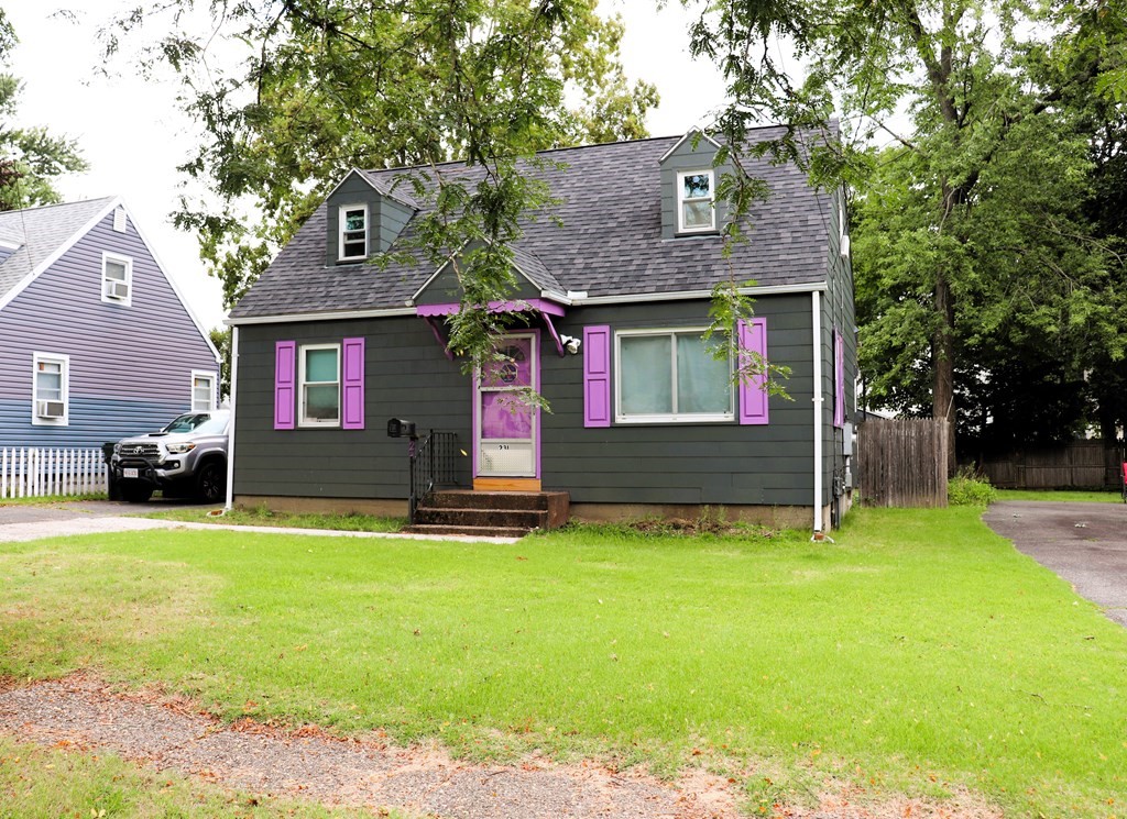 231 Rosewell Street Springfield, MA 01109 - Photo 2 of 24 a front view of a house with a yard