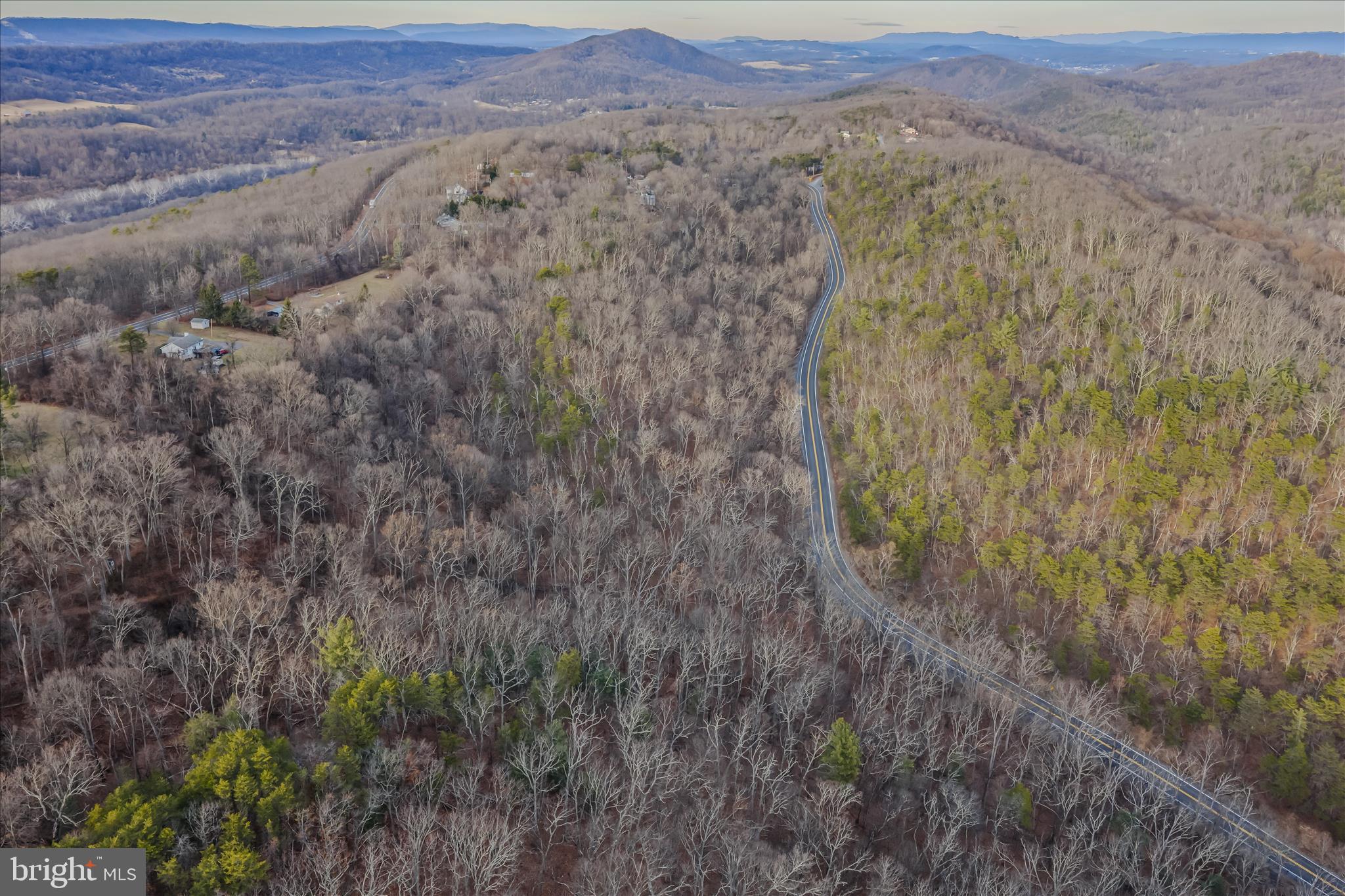Quaint Acres Lane Berkeley Springs, WV 25411 - Photo 28 of 61 a view of a lush green forest with trees and some houses