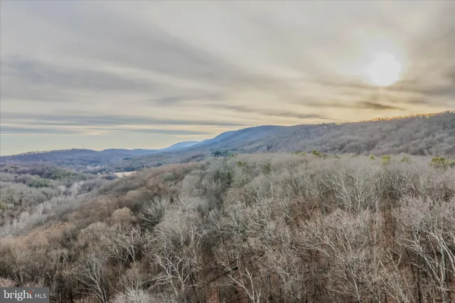 a view of an outdoor space and mountain view