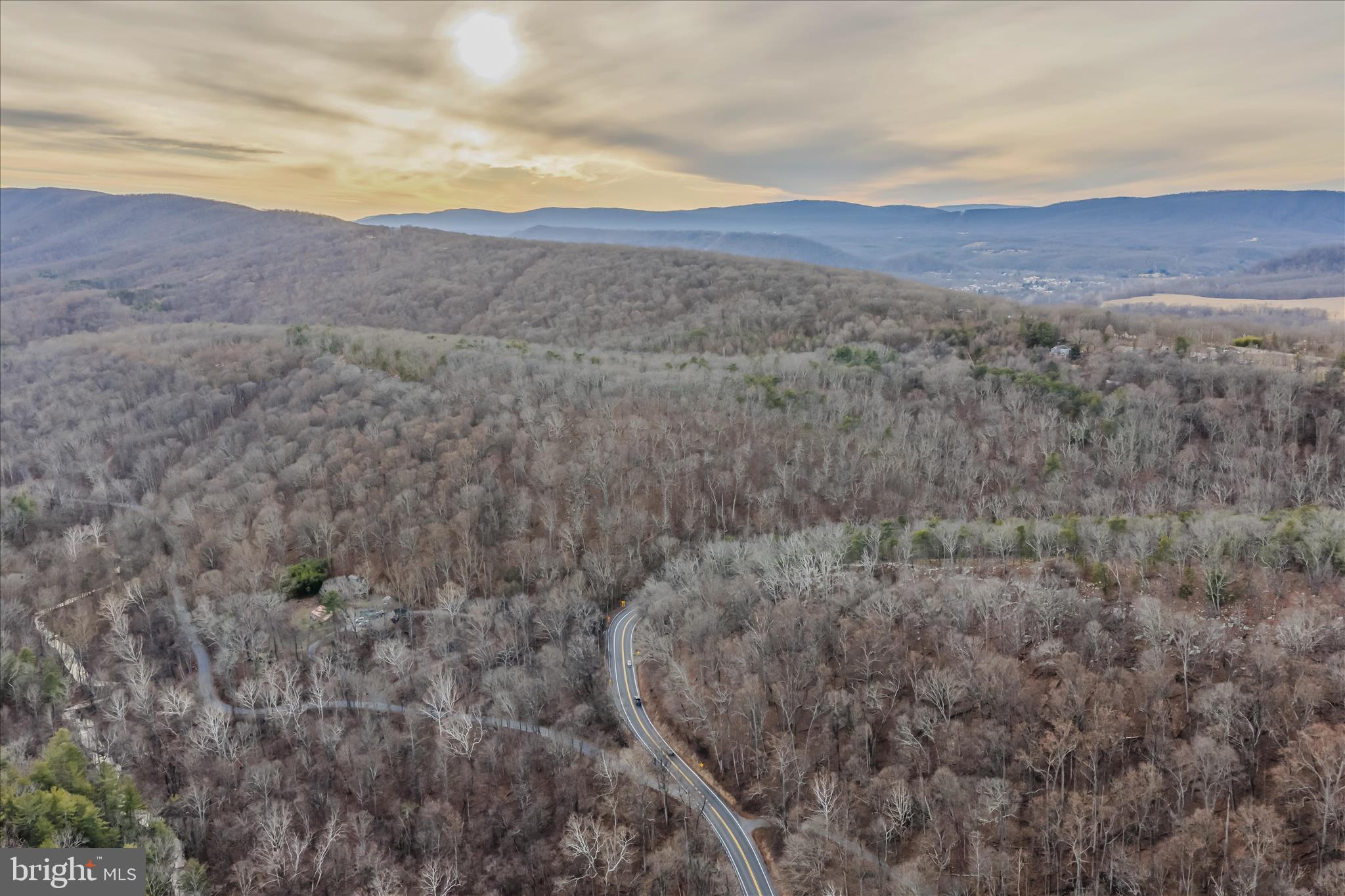 Quaint Acres Lane Berkeley Springs, WV 25411 - Photo 39 of 61 a view of a dry yard with mountains in the background